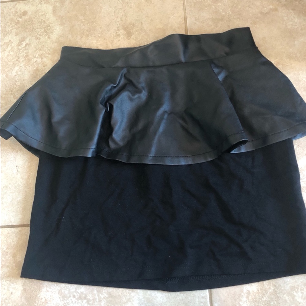 Black peplum skirt